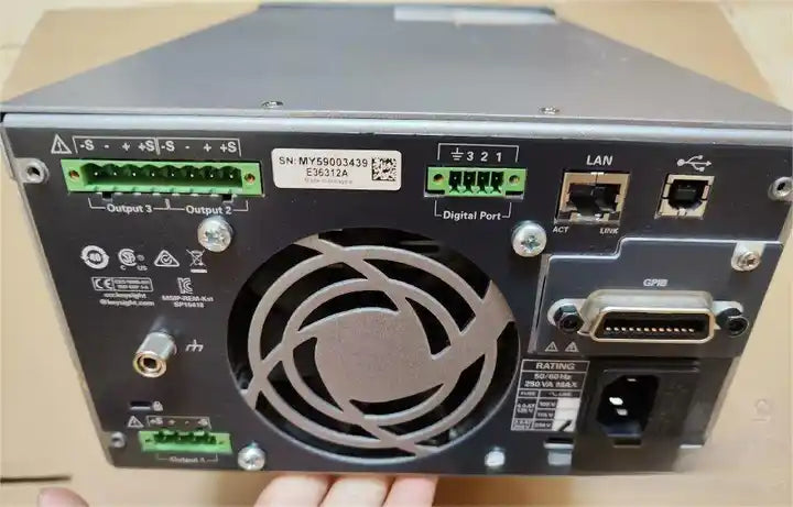 agilent/ Keysight E36312A DC power supply, triple-output, 6 V, 5 A used
